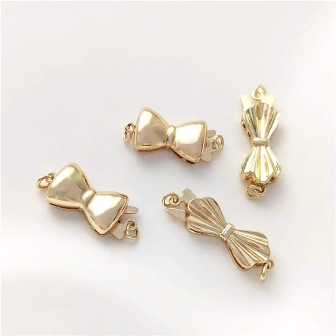 14K Gold Bow Insert Buckle Handmade Diy String Pearl Necklace Bracelet Jewelry Buckle Pendant Buckle Accessories B978
14K Gold Bow Insert Buckle Handmade Diy String Pearl Necklace Bracelet Jewelry Buckle Pendant Buckle Accessories B978