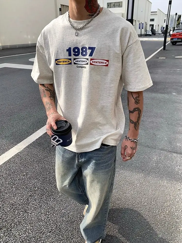 American 1987 letter print Korean retro round neck short-sleeved T-shirt for men loose casual off-shoulder white and gray couple
American 1987 letter print Korean retro round neck short-sleeved T-shirt for men loose casual off-shoulder white and gray couple