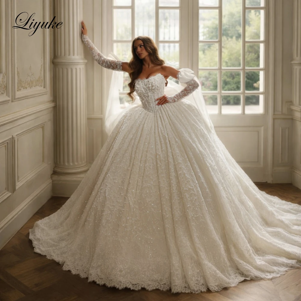Liyuke Custom Made Shiny Lace Strapless Ball Gown Wedding Dresses Beaded Lace With Bow Sleeves Luxury Puffy Bridal Gowns
Liyuke Custom Made Shiny Lace Strapless Ball Gown Wedding Dresses Beaded Lace With Bow Sleeves Luxury Puffy Bridal Gowns