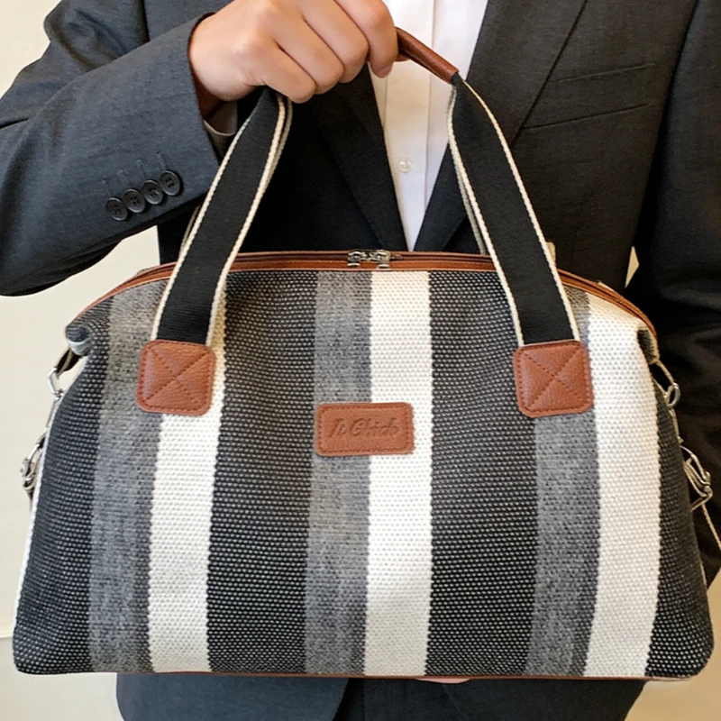 Новая вместительная полосатая холщовая сумка, модная универсальная сумка для повседневного использования, на плечо, через плечо, для женщин, сумка для поездок на работу.
Новая вместительная полосатая холщовая сумка, модная универсальная сумка для повседневного использования, на плечо, через плечо, для женщин, сумка для поездок на работу.