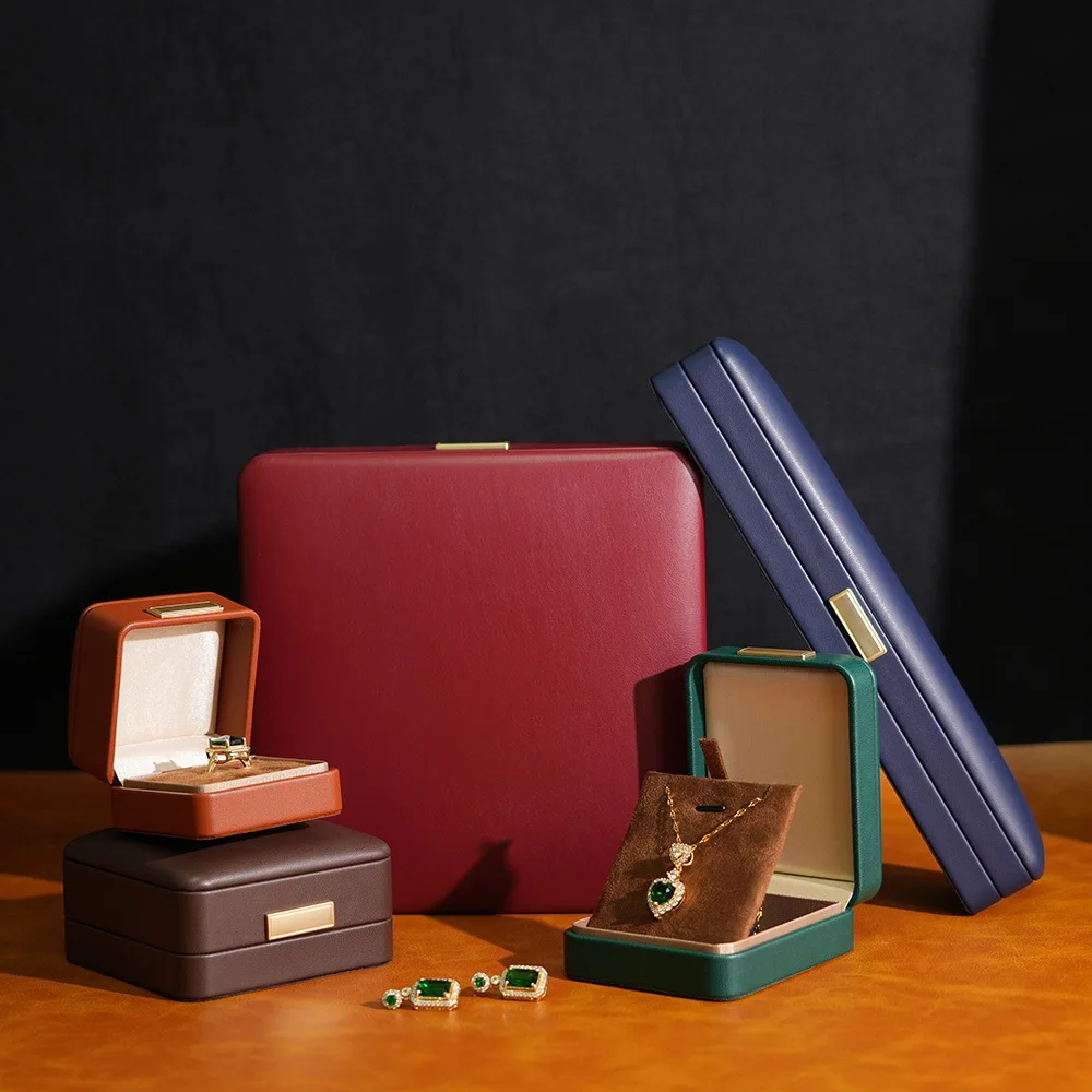 Retro PU Leather Jewelry Box with Gold Buckle Luxury Ring Earring Necklace Bracelet Holder for Wedding Engagement Gift
Retro PU Leather Jewelry Box with Gold Buckle Luxury Ring Earring Necklace Bracelet Holder for Wedding Engagement Gift