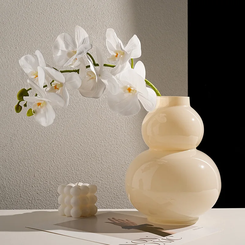 Retro cream-style ceramic vase ornaments, living room transparent flower arrangements, high-end water-cultivated dining table de
Retro cream-style ceramic vase ornaments, living room transparent flower arrangements, high-end water-cultivated dining table de