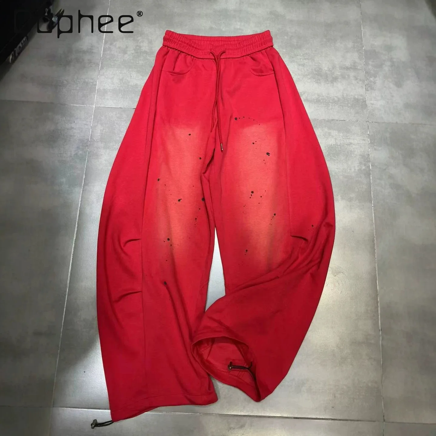 European Casual Pants Women's 2026 Summer New Pleated Design Ink Splashing Fashion Loose Elastic Drawstring Scimitar Trousers
European Casual Pants Women's 2026 Summer New Pleated Design Ink Splashing Fashion Loose Elastic Drawstring Scimitar Trousers