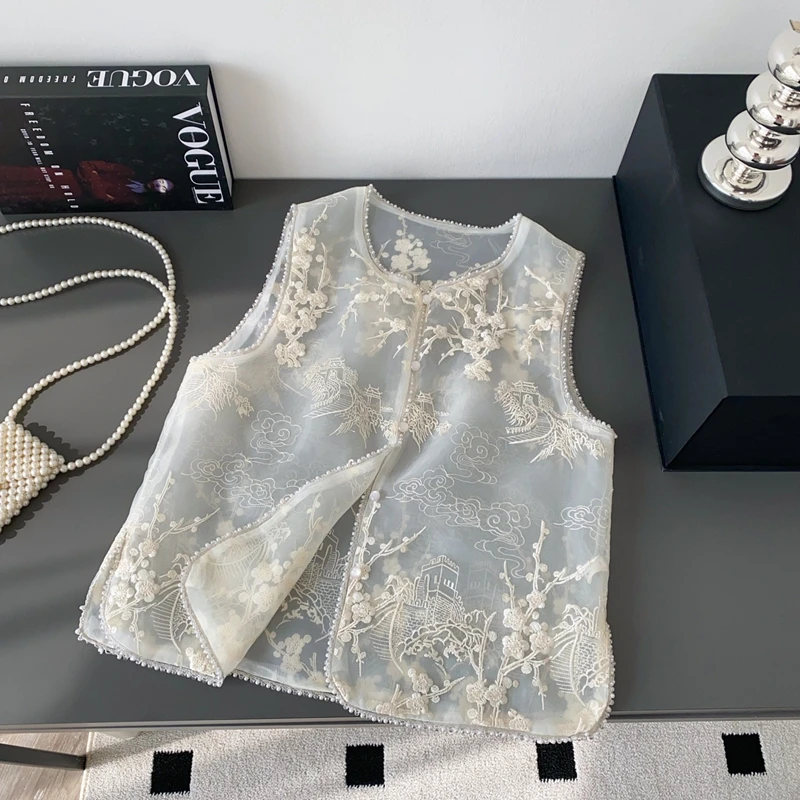 New Chinese Style Sleeveless Vest Women's Summer Mesh Embroidery Hollow Breathable Design High-End Niche Beauty Top
New Chinese Style Sleeveless Vest Women's Summer Mesh Embroidery Hollow Breathable Design High-End Niche Beauty Top