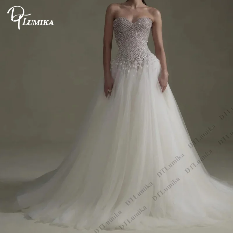 DTLumika Sweetheart Beaded Tulle Ball Gown Wedding Dress Mesmerizing Tailored Bride Dresses Sparkling Flowing Wedding Dresses
DTLumika Sweetheart Beaded Tulle Ball Gown Wedding Dress Mesmerizing Tailored Bride Dresses Sparkling Flowing Wedding Dresses