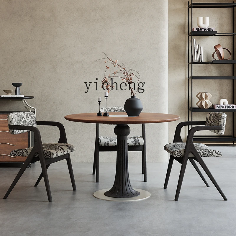 TQQ simple black walnut retro solid wood round restaurant dining table and chair combination
TQQ simple black walnut retro solid wood round restaurant dining table and chair combination