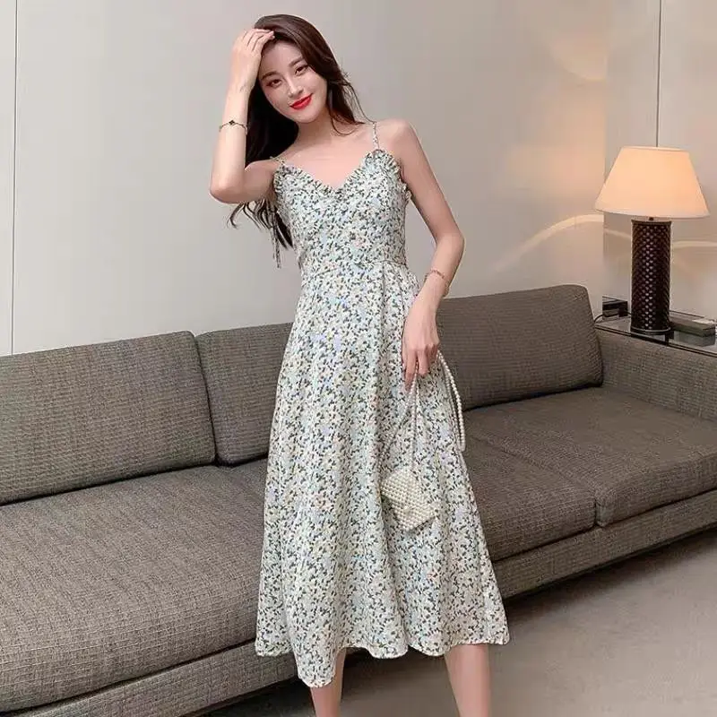 Summer New Women's Chiffon Dress V-neck Printed High Waist Strap A-line Skirt
Summer New Women's Chiffon Dress V-neck Printed High Waist Strap A-line Skirt