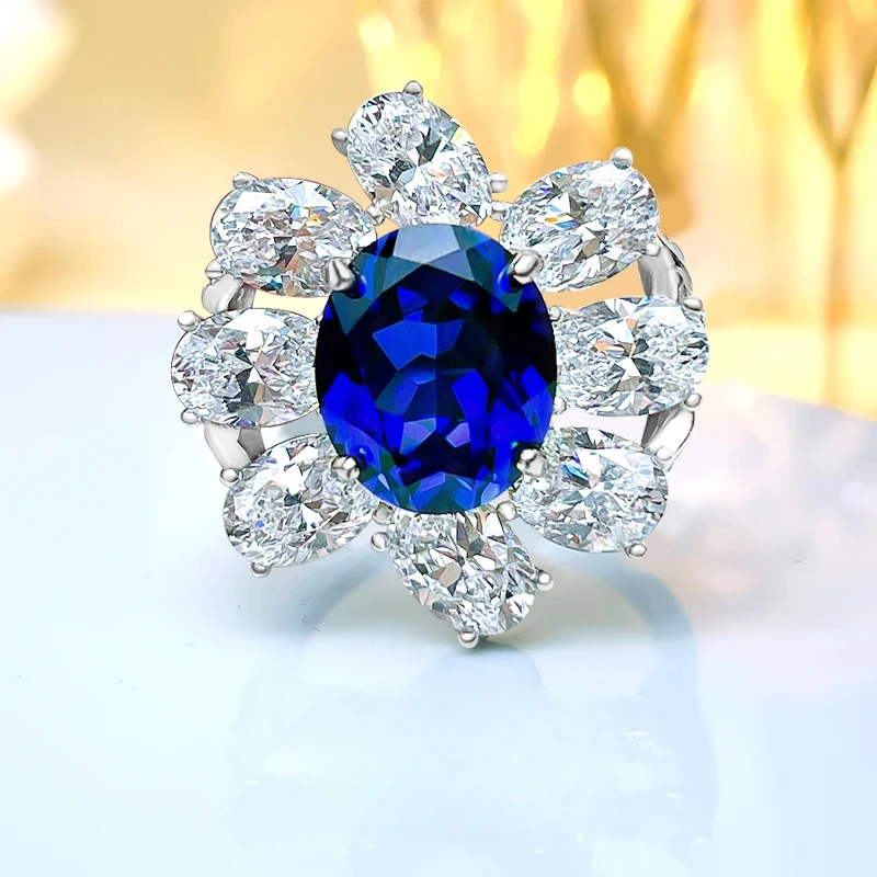 Fashionable and Elegant High Top Flower Red Royal Blue Treasure Ring 925 Sterling Silver Luxury Style Wedding Jewelry
Fashionable and Elegant High Top Flower Red Royal Blue Treasure Ring 925 Sterling Silver Luxury Style Wedding Jewelry