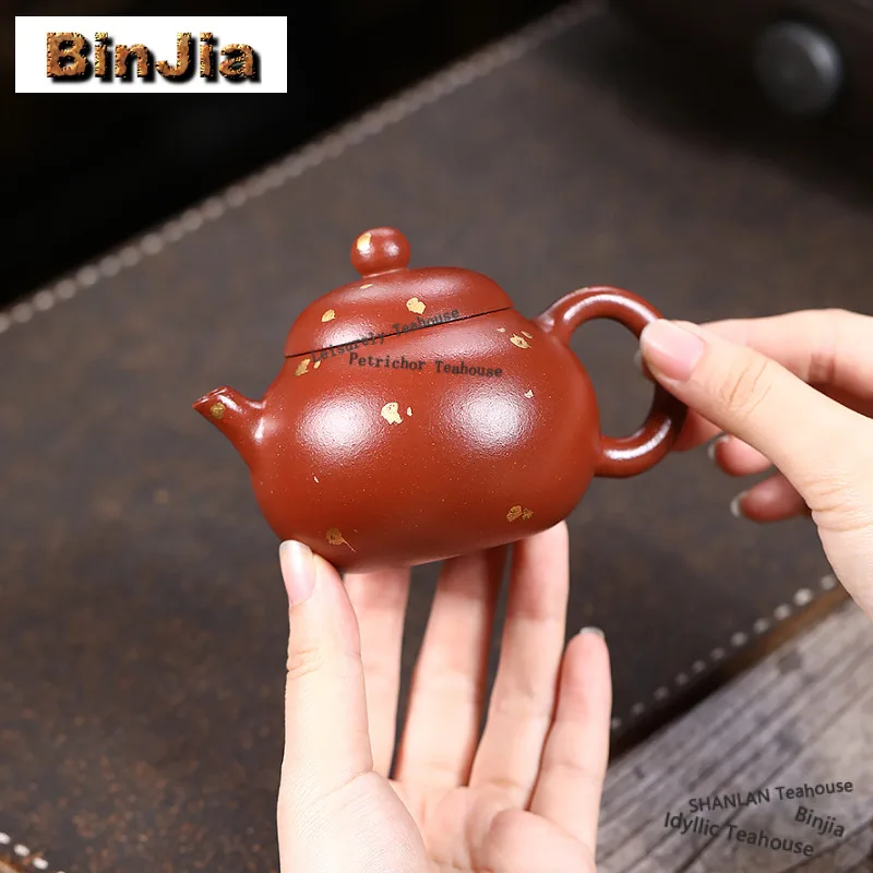 150ml Antique Yixing Purple Clay Teapots Handmade Sprinkle Gold Wen Dan Pot Raw Ore Dahongpao Mud Kettle Chinese Zisha Tea Set
150ml Antique Yixing Purple Clay Teapots Handmade Sprinkle Gold Wen Dan Pot Raw Ore Dahongpao Mud Kettle Chinese Zisha Tea Set
