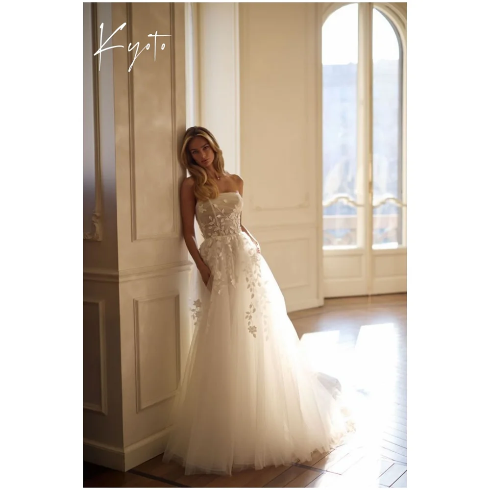 Kyoto Customized Flower Appliques Glitter Formal Wedding Dress Strapless Long Trainفستان زفاف Zip Back Sleeveless Abito da sposa
Kyoto Customized Flower Appliques Glitter Formal Wedding Dress Strapless Long Trainفستان زفاف Zip Back Sleeveless Abito da sposa
