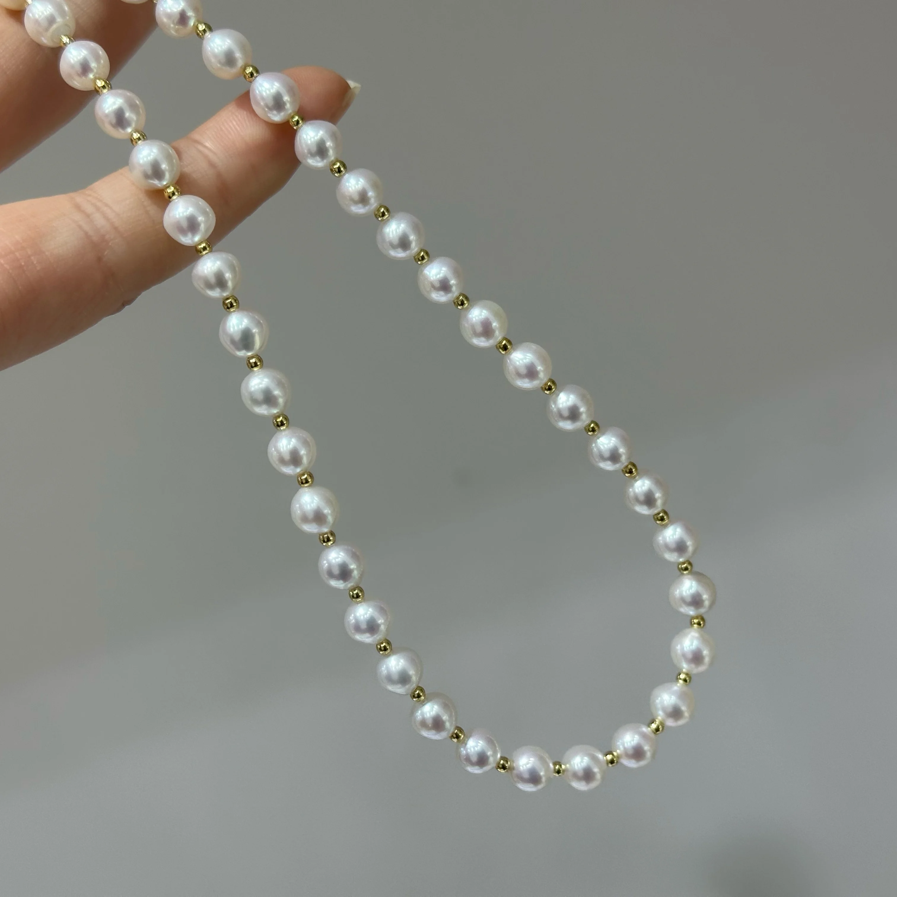Natural necklace AAAA7-8mm pearl starry sky interval small golden ball pearl necklace 16in/18in/925s
Natural necklace AAAA7-8mm pearl starry sky interval small golden ball pearl necklace 16in/18in/925s