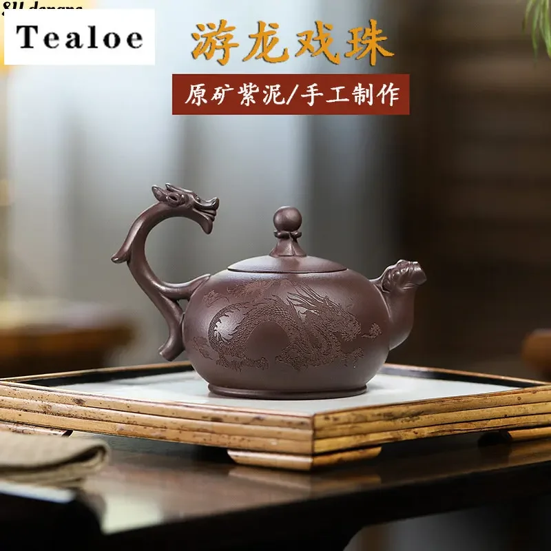 Handmade New Chinese Purple Clay Dragon Teapot Raw Ore Purple Mud Household Tea Maker Kungfu Tea Set Accessories Hot Sales
Handmade New Chinese Purple Clay Dragon Teapot Raw Ore Purple Mud Household Tea Maker Kungfu Tea Set Accessories Hot Sales