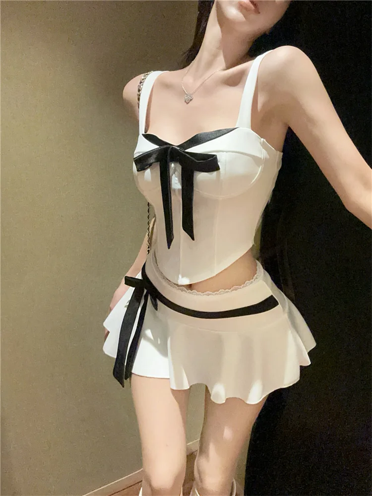 Black White Two Piece Sets Spicy Girl Style Sexy Bow Contrasting Color Sweet Irregular Fishbone Tank Top and Pleated Skirt Sets
Black White Two Piece Sets Spicy Girl Style Sexy Bow Contrasting Color Sweet Irregular Fishbone Tank Top and Pleated Skirt Sets