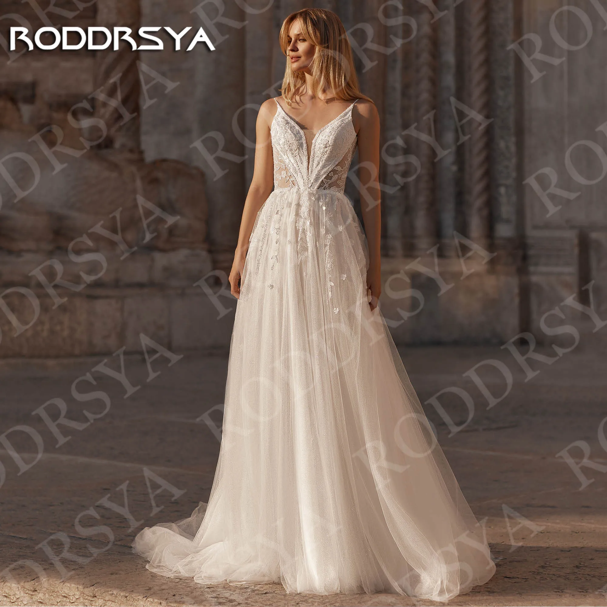 RODDRSYA Exquisite Wedding Dresses A Line Illusion Bridal Gowns Spaghetti Strap V Neck Lace Customized Open Back robe de mariée
RODDRSYA Exquisite Wedding Dresses A Line Illusion Bridal Gowns Spaghetti Strap V Neck Lace Customized Open Back robe de mariée