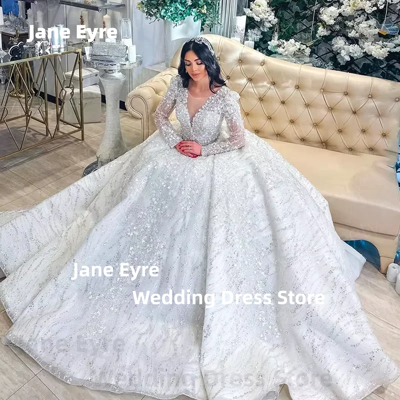 Свадебное платье из бисера по индивидуальному заказу, бальное платье из органзы с вышивкой и блестками, с круглым вырезом и длинными рукавами, свадебное платье на шнуровке, Vestido De Novia
Свадебное платье из бисера по индивидуальному заказу, бальное платье из органзы с вышивкой и блестками, с круглым вырезом и длинными рукавами, свадебное платье на шнуровке, Vestido De Novia