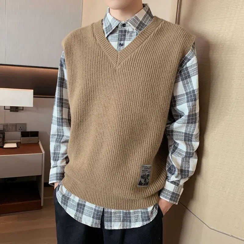 Свободный крой, мужской вязаный кардиган с v-образным вырезом, повседневный свитер в японском стиле, жилет, верхняя одежда больших размеров с модными эстетиками для колледжа
Свободный крой, мужской вязаный кардиган с v-образным вырезом, повседневный свитер в японском стиле, жилет, верхняя одежда больших размеров с модными эстетиками для колледжа