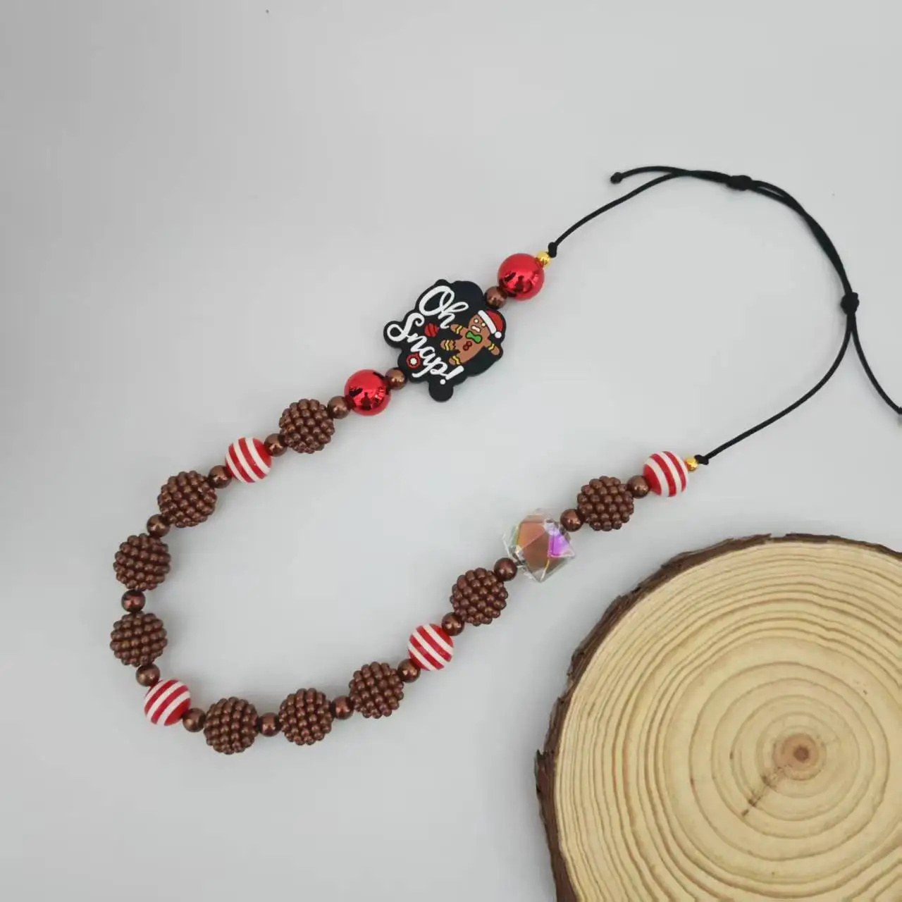 Ожерелье ручной работы с коричневыми и красными бусинами для детей, детское колье в стиле пряничного человечка, детское рождественское ожерелье
Ожерелье ручной работы с коричневыми и красными бусинами для детей, детское колье в стиле пряничного человечка, детское рождественское ожерелье