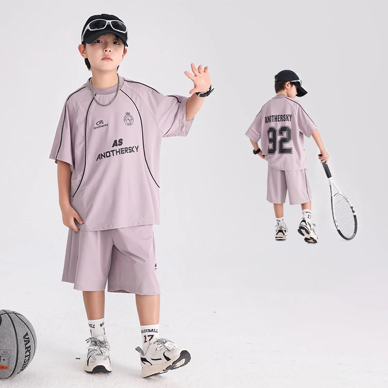 Summer Quick Drying Sports Basketball Suit Short Sleeved Shorts Boys' Set 2026 New Children's Clothing Ice Silk Two-Piece Set
Summer Quick Drying Sports Basketball Suit Short Sleeved Shorts Boys' Set 2026 New Children's Clothing Ice Silk Two-Piece Set