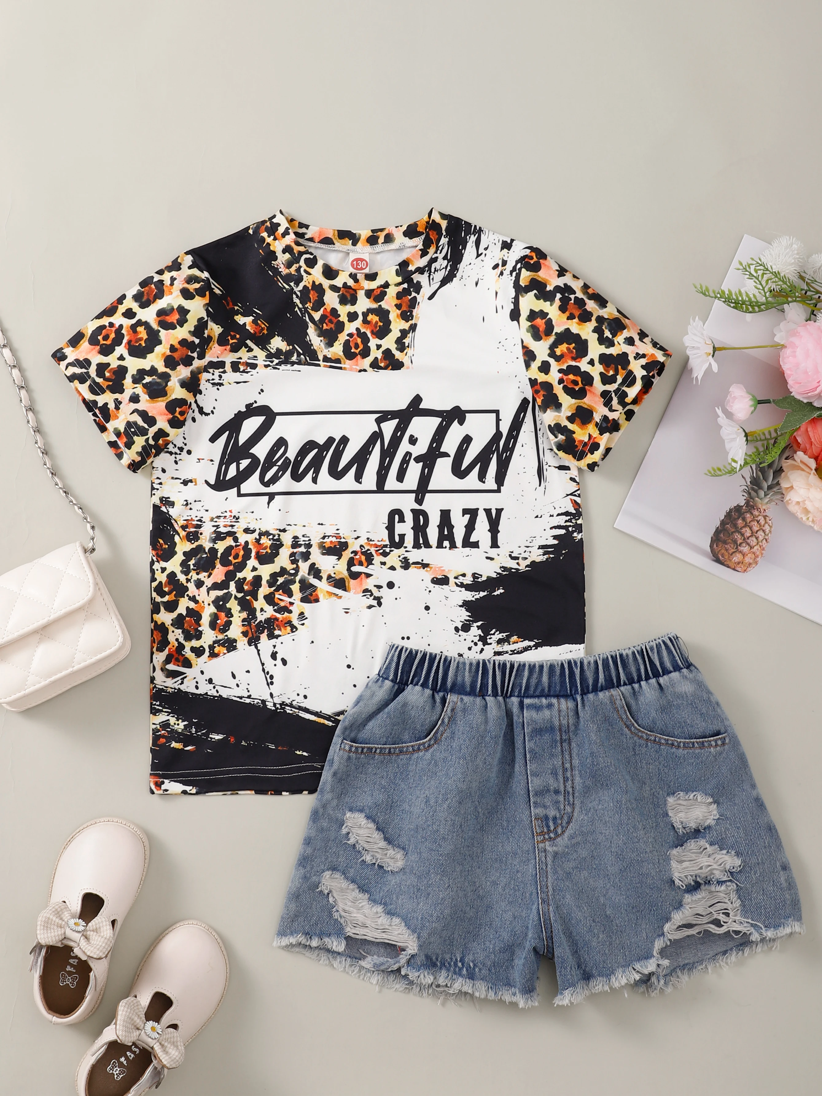 Summer 2pcs Set for Girls with Fashionable Leopard Letter Pattern Short Sleeve T-Shirt And Denim Shorts - Trendy Kids' Outfit
Summer 2pcs Set for Girls with Fashionable Leopard Letter Pattern Short Sleeve T-Shirt And Denim Shorts - Trendy Kids' Outfit