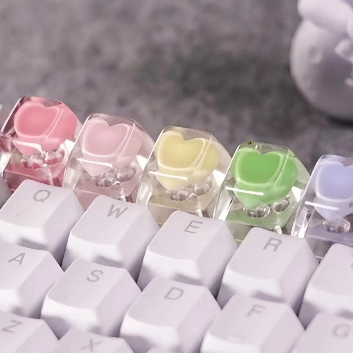 Симпатичные колпачки для клавиш из смолы с сердечком для Cherry MX Switch, механическая игровая клавиатура, новинка ручной работы, ручная клавиатура
Симпатичные колпачки для клавиш из смолы с сердечком для Cherry MX Switch, механическая игровая клавиатура, новинка ручной работы, ручная клавиатура