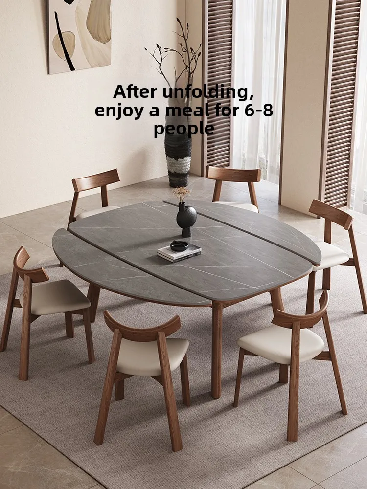 Retractable rock slab solid wood dining table Household small apartment variable round table Modern simple light luxury square
Retractable rock slab solid wood dining table Household small apartment variable round table Modern simple light luxury square