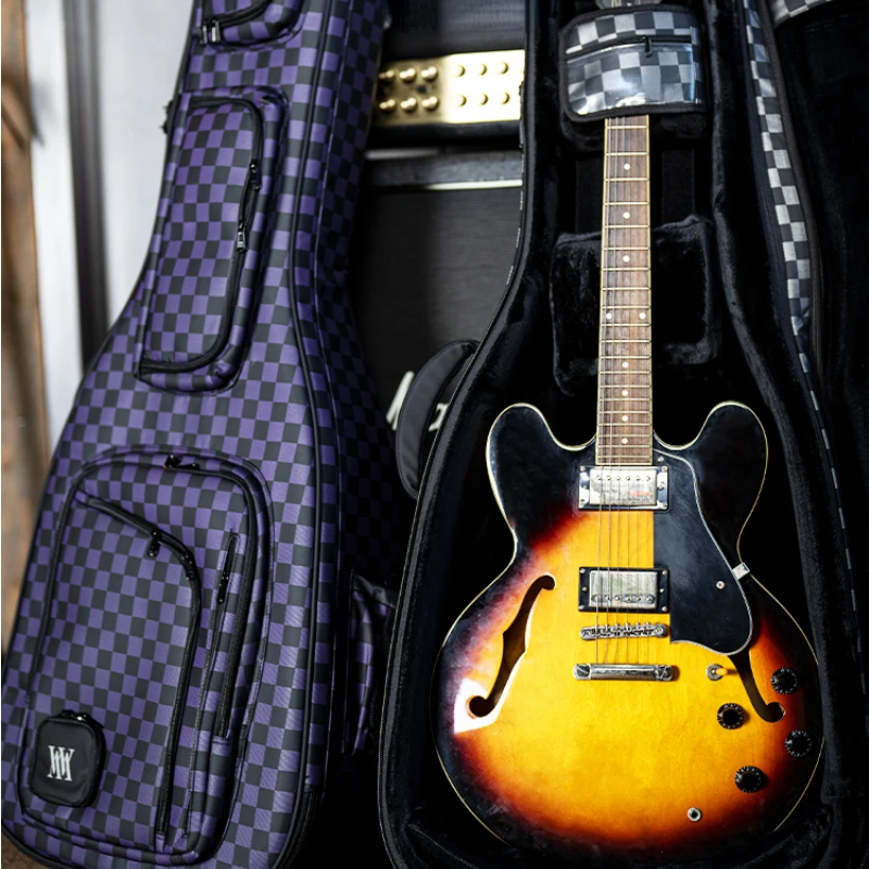 Guitar Bag Thickened Drop-Resistant Waterproof Air Consignment Jazz Guitar Bag
Guitar Bag Thickened Drop-Resistant Waterproof Air Consignment Jazz Guitar Bag
