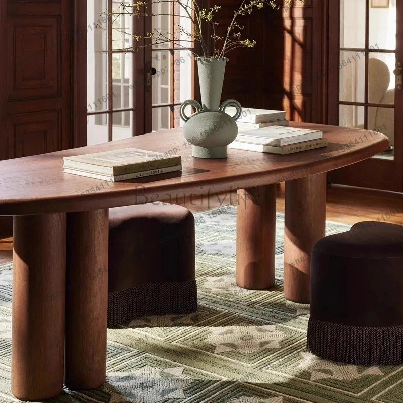 Solid wood dining table French medieval wabi oak log table Household simple designer oval desk
Solid wood dining table French medieval wabi oak log table Household simple designer oval desk