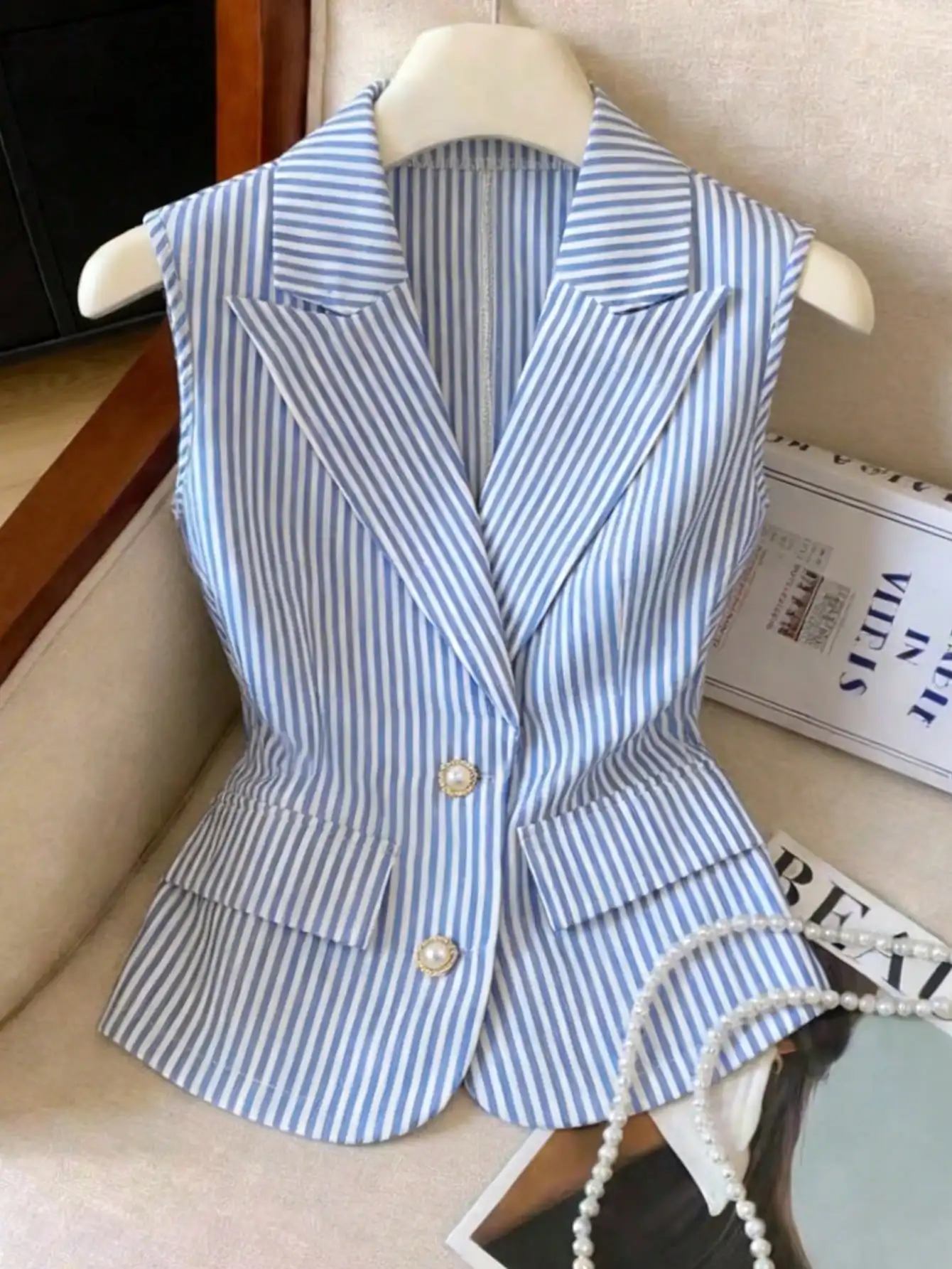 Elegant striped button vest for women
Elegant striped button vest for women