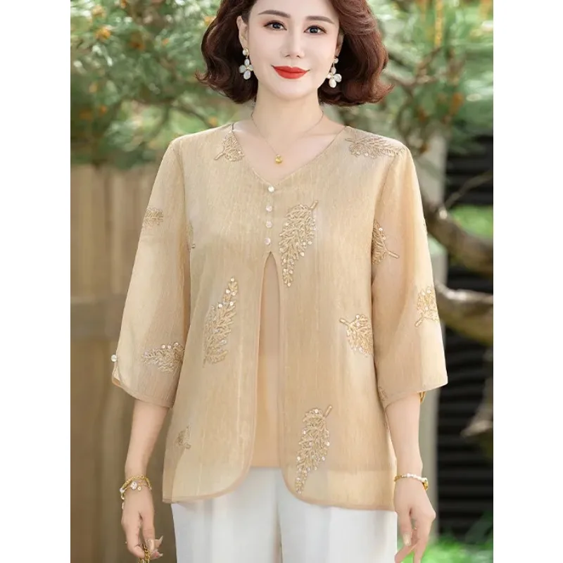 Women's V-Neck 3/4 Sleeve Chiffon Blouse with Leaf Embroidery Beading Fake Two-Piece Casual Top for Middle-Aged Ladies
Women's V-Neck 3/4 Sleeve Chiffon Blouse with Leaf Embroidery Beading Fake Two-Piece Casual Top for Middle-Aged Ladies