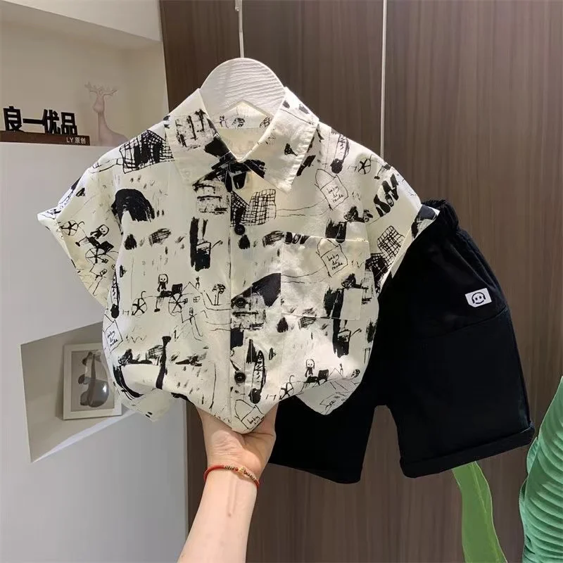 Boys' Summer Set 2024 New Boys' Shirts and Shorts Two piece Set Children's Summer Fashion Cartoon Clothes KidsClothing
Boys' Summer Set 2024 New Boys' Shirts and Shorts Two piece Set Children's Summer Fashion Cartoon Clothes KidsClothing