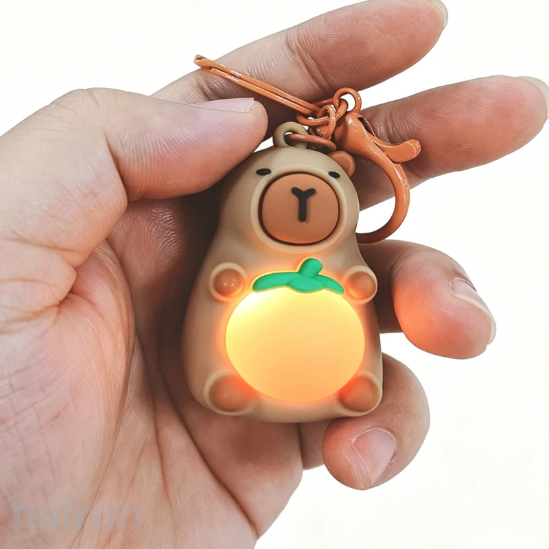 Cute Capybara Glowing Keychain ,Light-Up Orange Belly, mini Capibara Keyring Backpack decorative For Children's Birthday Gifts
Cute Capybara Glowing Keychain ,Light-Up Orange Belly, mini Capibara Keyring Backpack decorative For Children's Birthday Gifts