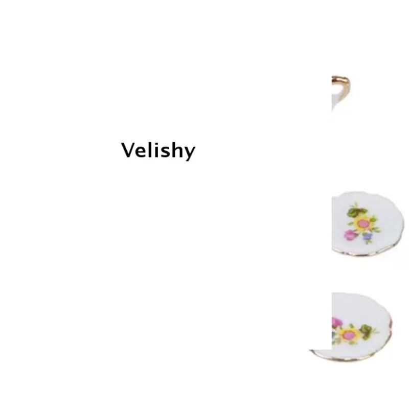 Миниатюрный фарфоровый чайный сервиз для кукольного домика 1:12, 8 предметов: тарелки, чашки, блюдца.
Миниатюрный фарфоровый чайный сервиз для кукольного домика 1:12, 8 предметов: тарелки, чашки, блюдца.