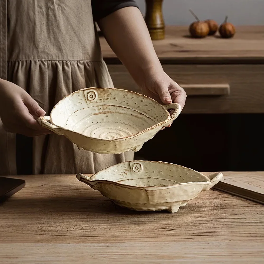 Coarse ceramic plates Japanese-style paid ceramic double-ear plates household hand-made high-end salad bowl tableware.
Coarse ceramic plates Japanese-style paid ceramic double-ear plates household hand-made high-end salad bowl tableware.
