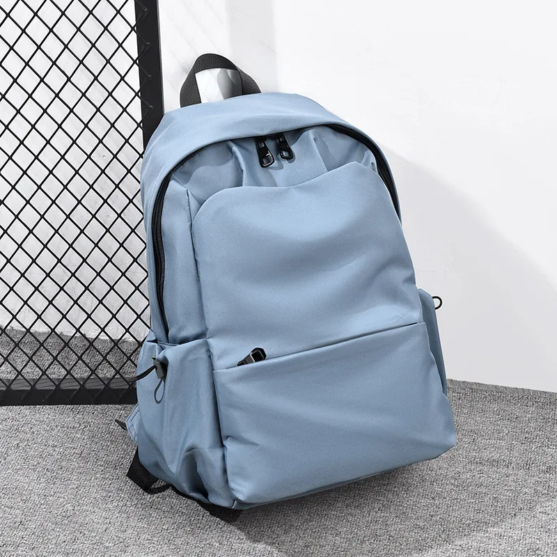 Light Gray Minimalist Casual Backpack with Smooth Fabric and Simple Zipper Design Suitable for Daily School Work and Casual Use
Light Gray Minimalist Casual Backpack with Smooth Fabric and Simple Zipper Design Suitable for Daily School Work and Casual Use