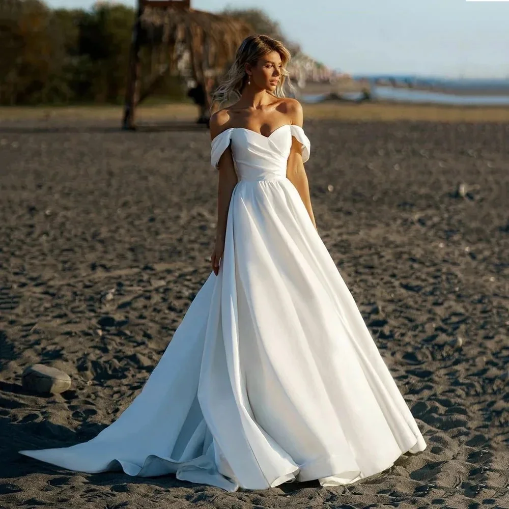 Elegant A Line Bridal Gowns 2024 Boat Neck Satin Backless Wedding Dress Customized High Quality Princess Bride Dresses
Elegant A Line Bridal Gowns 2024 Boat Neck Satin Backless Wedding Dress Customized High Quality Princess Bride Dresses