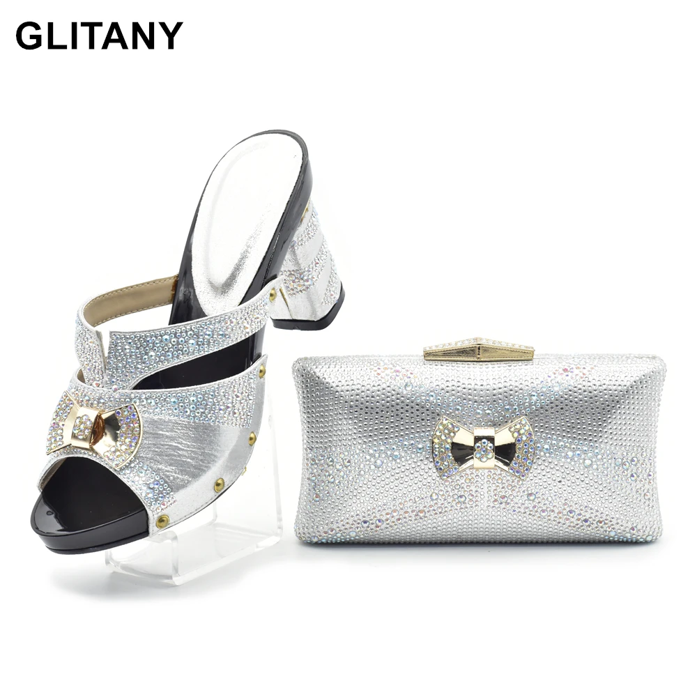 Новейшие туфли и сумочки серебристого цвета в африканском стиле, итальянские женские итальянские туфли и сумки, подходящие к обуви и сумке, набор с камнями
Новейшие туфли и сумочки серебристого цвета в африканском стиле, итальянские женские итальянские туфли и сумки, подходящие к обуви и сумке, набор с камнями
