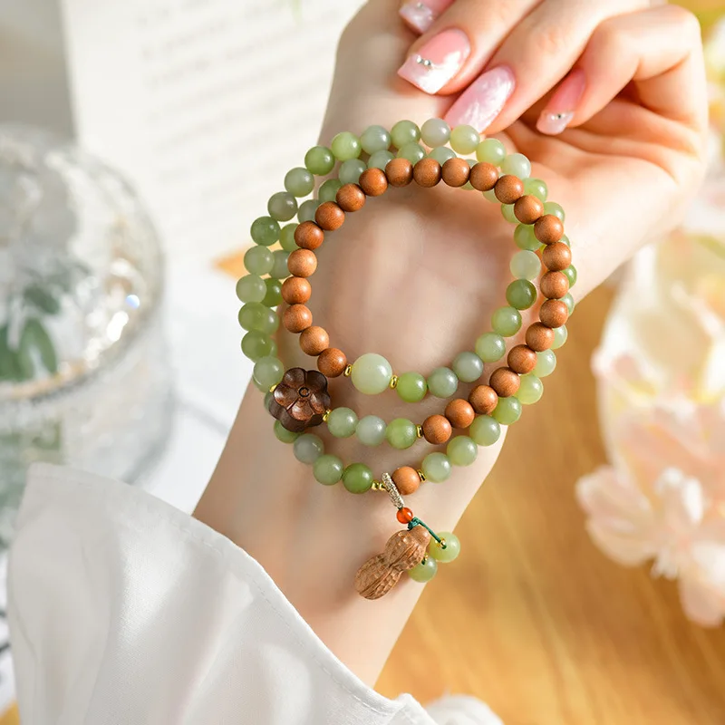 Браслет из натурального нефрита и сандалового дерева с тройным плетением и подвеской в виде цветка-арахиса, новый браслет в китайском стиле, подарки
Браслет из натурального нефрита и сандалового дерева с тройным плетением и подвеской в виде цветка-арахиса, новый браслет в китайском стиле, подарки