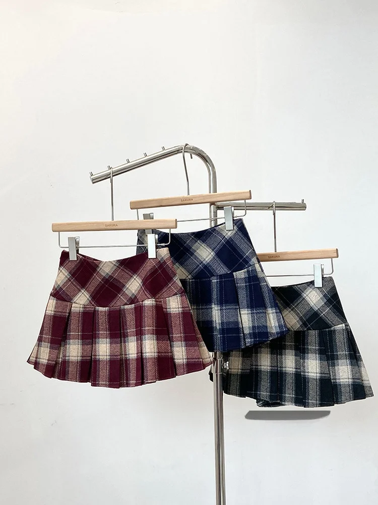 Клетчатая юбка трапециевидной формы с высокой талией, женская зимняя новая корейская шерстяная юбка, повседневная клетчатая юбка трапециевидной формы с высокой талией
Клетчатая юбка трапециевидной формы с высокой талией, женская зимняя новая корейская шерстяная юбка, повседневная клетчатая юбка трапециевидной формы с высокой талией