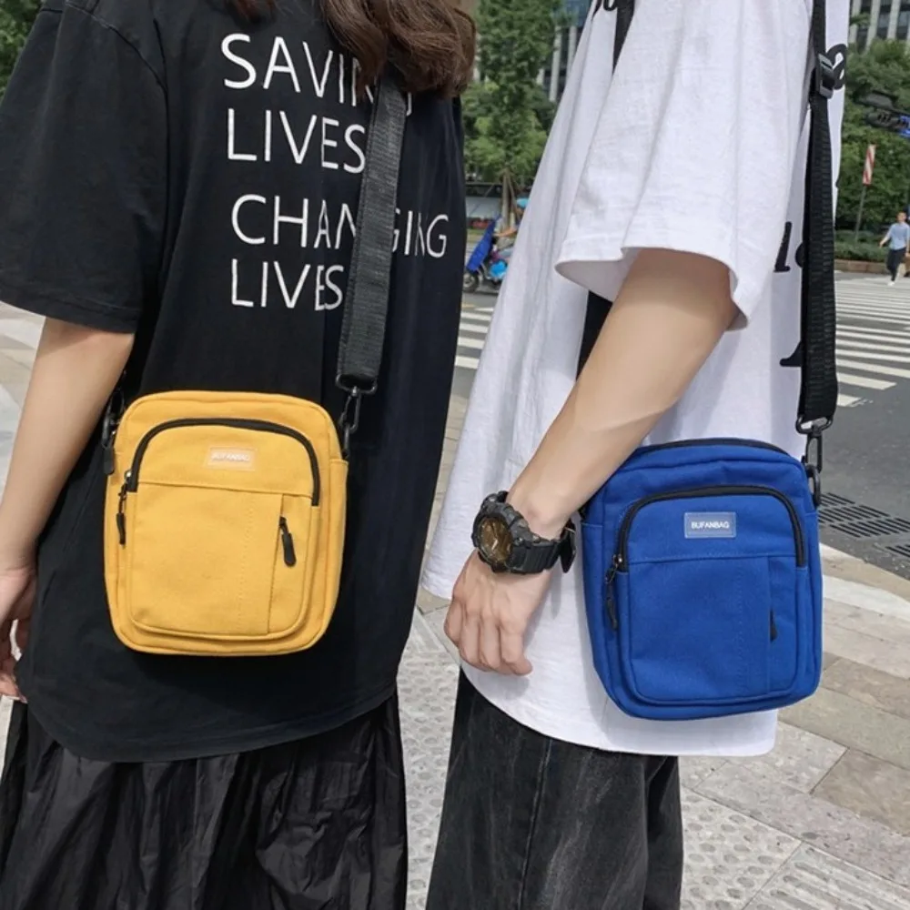 Nylon Men's Shoulder Bag Large Capacity Square Canvas Crossbody Bag Korean Style Multifunctional Sports Phone Bag Outdoor
Nylon Men's Shoulder Bag Large Capacity Square Canvas Crossbody Bag Korean Style Multifunctional Sports Phone Bag Outdoor