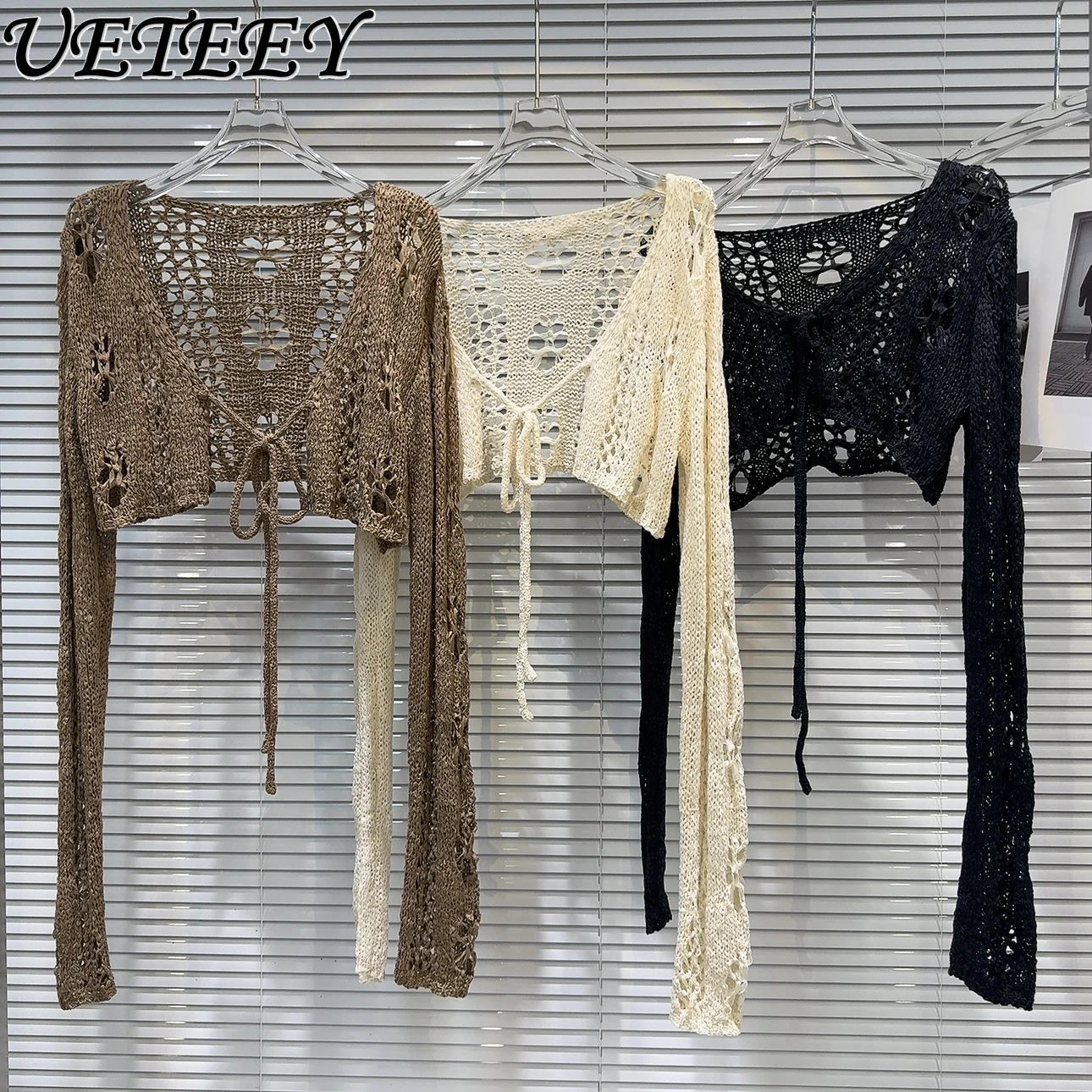 Spring Summer New American Spice Girl Hollowed-out Link Short Cardigan Straps Solid Color Knitted Long-sleeved Shawl Jacket
Spring Summer New American Spice Girl Hollowed-out Link Short Cardigan Straps Solid Color Knitted Long-sleeved Shawl Jacket