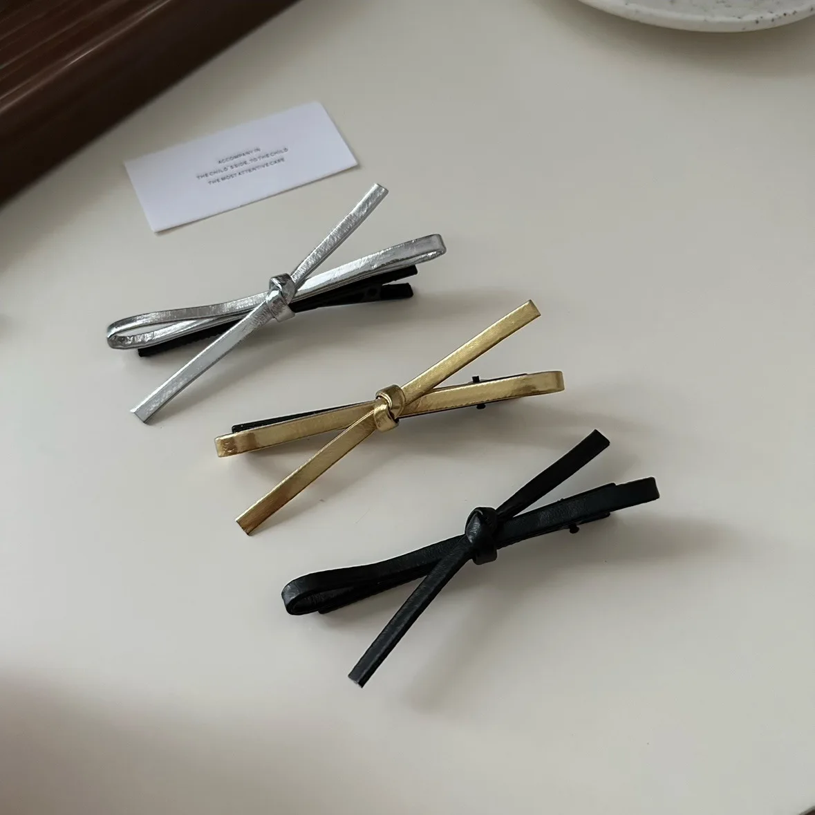 Premium Leather Bow Snap Hair Clip for Bangs Retro Simple Design Non Slip Strong Hold Soft Lightweight Portable
Premium Leather Bow Snap Hair Clip for Bangs Retro Simple Design Non Slip Strong Hold Soft Lightweight Portable