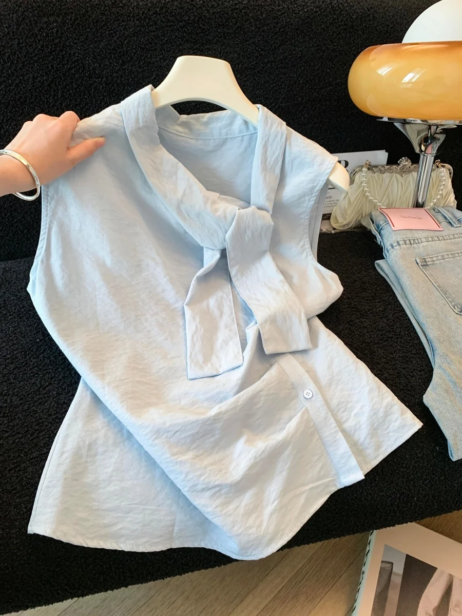 French Style Unique Beautiful Tie-Detail Sleeveless Collar Shirt for Women Elegant Summer Design White Shirt Casual Wear
French Style Unique Beautiful Tie-Detail Sleeveless Collar Shirt for Women Elegant Summer Design White Shirt Casual Wear