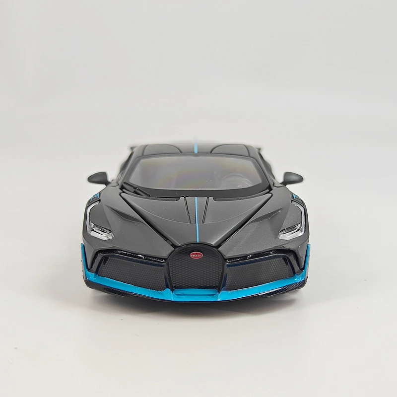 rastar 1: 32 simulation Bugatti divo alloy racing car model, doors can be opened, sound and light return power supercar gift
rastar 1: 32 simulation Bugatti divo alloy racing car model, doors can be opened, sound and light return power supercar gift