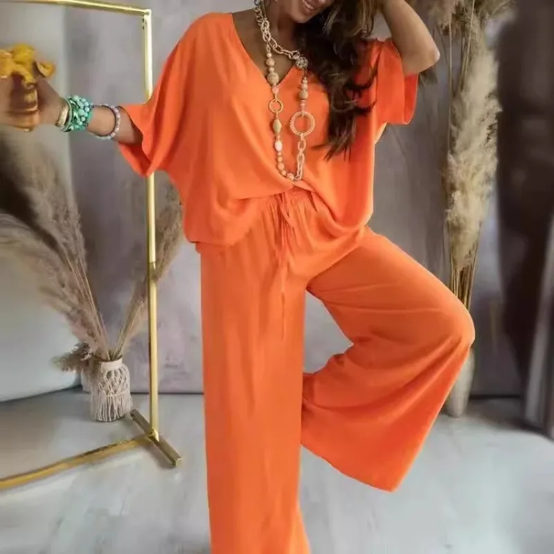 Women's V-Neck Batwing Sleeve Top Drawstring Waist Wide Leg Pants Two-Piece Set
Women's V-Neck Batwing Sleeve Top Drawstring Waist Wide Leg Pants Two-Piece Set