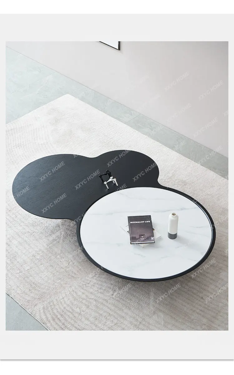 EE minimalist cloud rock slab coffee table cream wind black and white special-shaped coffee table
EE minimalist cloud rock slab coffee table cream wind black and white special-shaped coffee table
