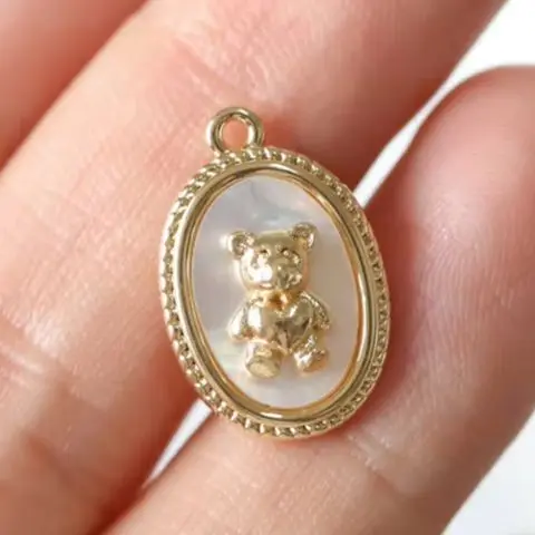2PCS Copper-Plated Real Gold Oval White Mother-of-Pearl Cute Little Bear Pendant 17.7x11.8mm DIY Handmade Jewelry Accessory
2PCS Copper-Plated Real Gold Oval White Mother-of-Pearl Cute Little Bear Pendant 17.7x11.8mm DIY Handmade Jewelry Accessory
