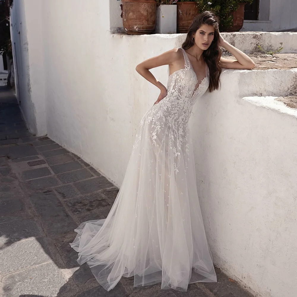Boho Wedding Dresses 2025 Ethereal A Line Bridal Gowns V Neck Wedding Gown Lace Appliques Tulle Bridal Dresses Customzied 
Boho Wedding Dresses 2025 Ethereal A Line Bridal Gowns V Neck Wedding Gown Lace Appliques Tulle Bridal Dresses Customzied