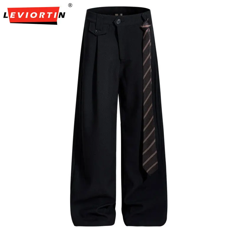 Мужские модные однотонные универсальные висячие свободные повседневные широкие брюки в европейском и американском стиле в стиле High Street Vibe
Мужские модные однотонные универсальные висячие свободные повседневные широкие брюки в европейском и американском стиле в стиле High Street Vibe