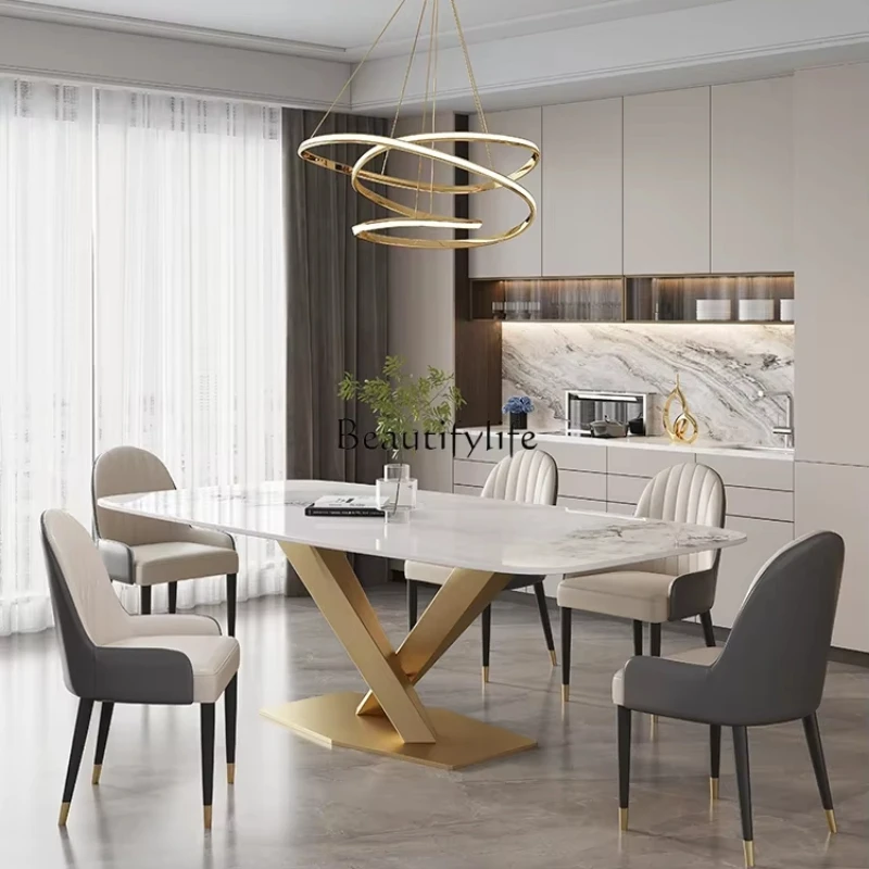 Light luxury bright rock slab household small apartment stainless steel Nordic rectangular dining table
Light luxury bright rock slab household small apartment stainless steel Nordic rectangular dining table