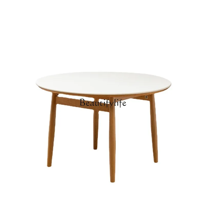 Solid wood rock slab round table Nordic white small apartment simple dining table
Solid wood rock slab round table Nordic white small apartment simple dining table
